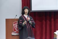 Prof Stella PANG giving a sharing about her research projects at the Second High Table Dinner in 2018–19